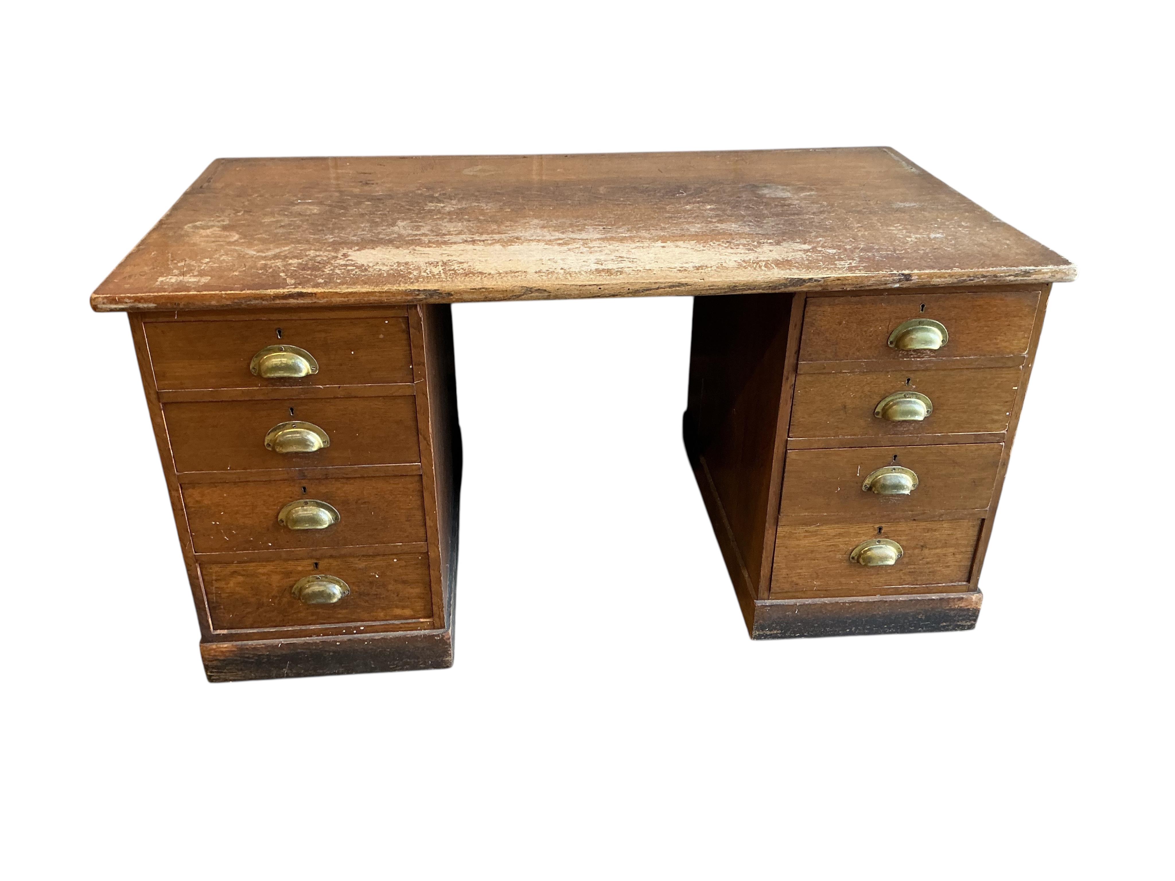 An early 20th century oak pedestal desk, adapted, width 152cm, depth 83cm, height 77cm